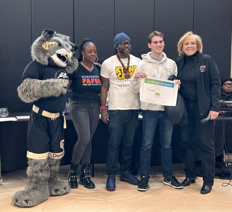 Several Students with the DU Mascot