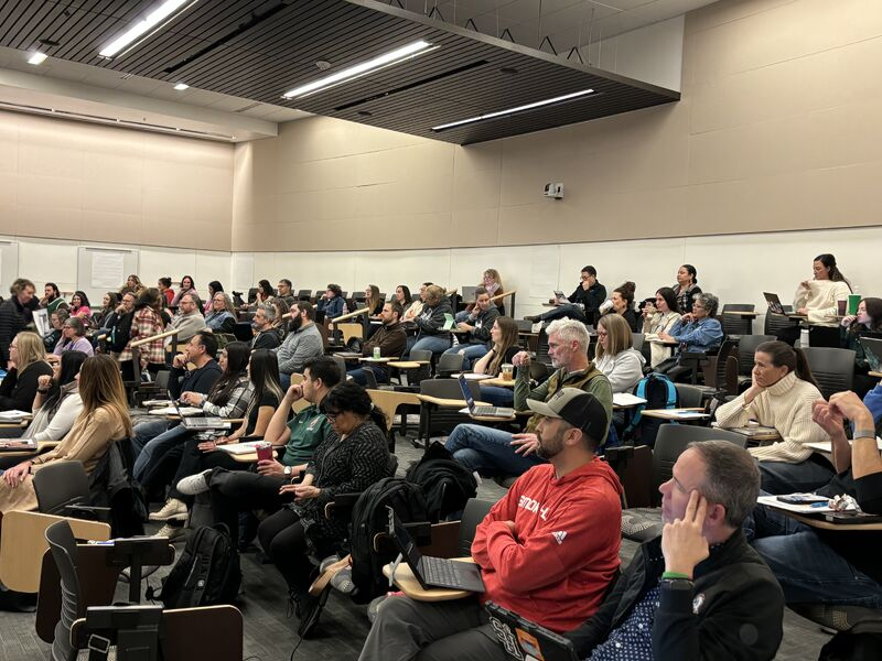 Group of Students Listening to a Presentation