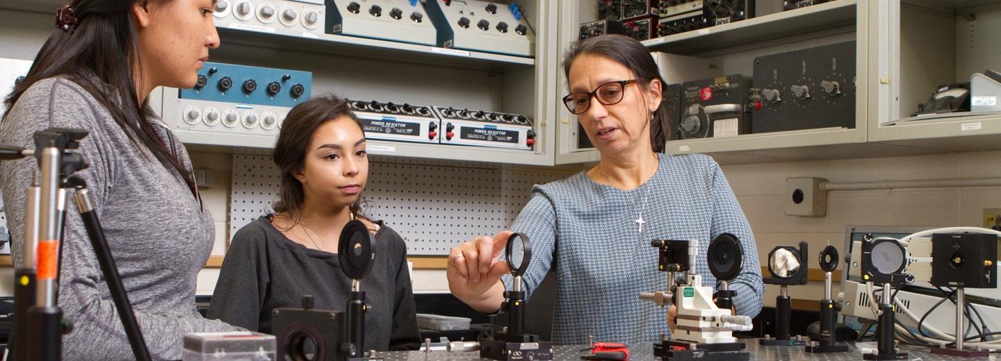 Teacher working with Female Engineers